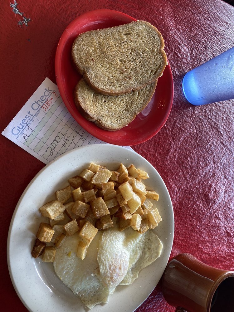 Eggs, home fries and toast on the table at Ruby's Kitchen